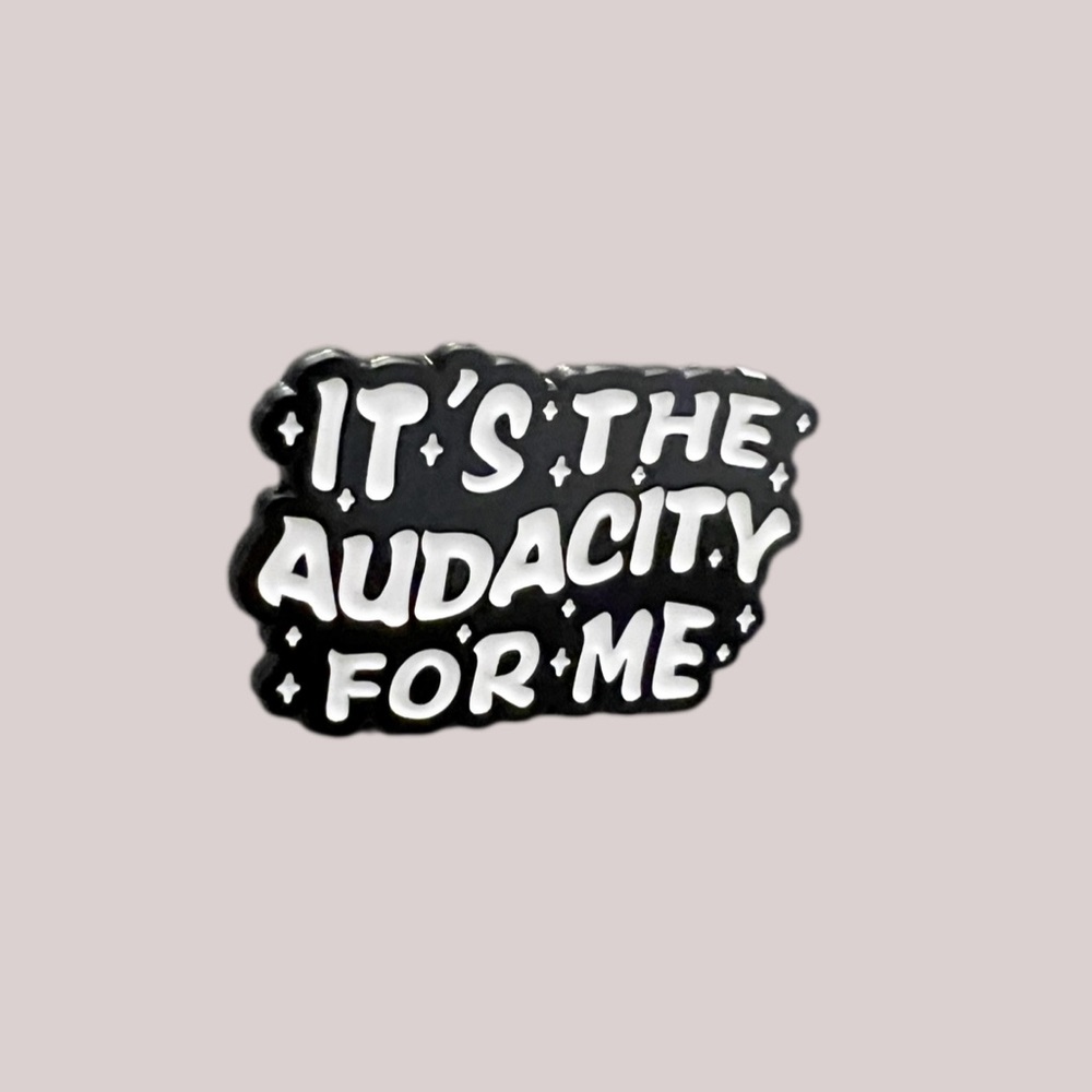 It’s The Audacity For Me” Enamel Pin – Black & White Statement Accessory